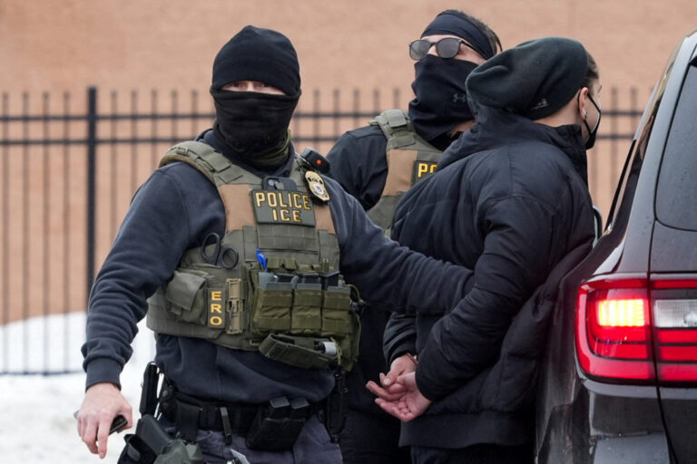 Members of U.S. Immigration and Customs Enforcement (ICE) conduct raids in Minneapolis