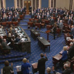 Chief Justice Roberts swears in senators for impeachment trial of President Trump at the U.S. Capitol in Washington